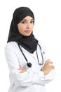 Arab doctor woman posing confident with folded arms