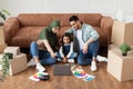 Arab family using pc in their new apartment Royalty Free Stock Photo