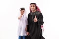 Arab father and son in ethnic clothes