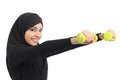 Arab fitness woman practicing sport doing weights