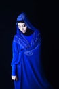 Arab girl, blue hijab, black background Royalty Free Stock Photo