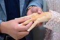 An Arab groom wears his brides wedding ring.