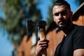 Arab hipster beard man lumberjack hold axe Royalty Free Stock Photo