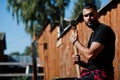 Arab hipster beard man lumberjack hold axe Royalty Free Stock Photo