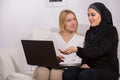 Arab immigrant talking with her family Royalty Free Stock Photo