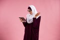 Arab intelligent woman in hijab is indignant