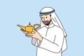 Arab man with aladdin lamp in hands makes wish, wanting to call genie or wizard to help