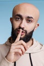 Arab man showing silence gesture Royalty Free Stock Photo