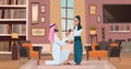 Arab man kneeling holding engagement ring proposing arabic woman marry him couple in love wedding marriage offer happy Royalty Free Stock Photo