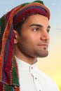 Arab man looks out expectantly Royalty Free Stock Photo