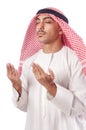 Arab man praying on white Royalty Free Stock Photo