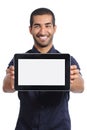 Arab man showing an app in a blank horizontal tablet screen