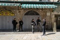 Arab man is stopped and ID checked by Israeli soldiers as he enters the old city of Jerusalem Royalty Free Stock Photo