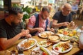 Arab men in restaurant enjoying Middle Eastern food