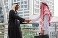 Arab middle eastern Business man handshake and meeting in outdoor downtown, Success and Happiness Team Concept Royalty Free Stock Photo