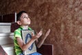 Arab muslim child with koran holy book