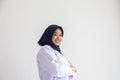 Arab Muslim doctor or nurse standing uniform white has stethoscope in the hospital, Portrait young hijab of a smiling area Royalty Free Stock Photo