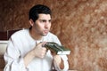 Arab muslim man with koran holy book with rosary Royalty Free Stock Photo