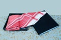 Arab Muslim men,s cultural head scarf named Shemagh isolated red and white fabric clothing accessory middle eastern traditional