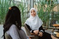 Arab muslim woman in conversation