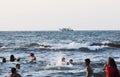 Arab people in sea with fishing boat Royalty Free Stock Photo