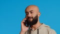 Arab person answering phone call in front of camera Royalty Free Stock Photo