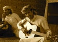 Arab playing the guitar Saudi