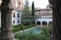 Arab pool of the courtyard of the Alcazar minor with the cloister of the Monastery in front