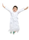 Arab Saudi boy jumping high with a big smile and open eyes