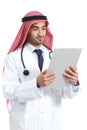 Arab saudi doctor reading a medical history