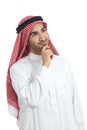 Arab saudi emirates man thinking and looking sideways Royalty Free Stock Photo