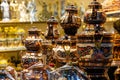 Arab souvenir shop with copper utensils: teapots, coffee pots and other utensils Royalty Free Stock Photo