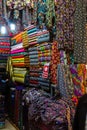 Arab store selling a variety of fabrics, Fabric in rolls