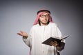 Arab student with book Royalty Free Stock Photo