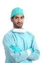 Arab surgeon serious doctor posing standing with folded arms