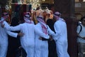 Arab traditional dressed people posing for photo