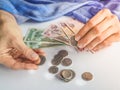 Arab woman believes dirhams UAE. Royalty Free Stock Photo