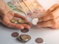 Arab woman believes dirhams UAE. Royalty Free Stock Photo