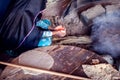 Arab woman makes bread in the beduin village in Egypt Royalty Free Stock Photo