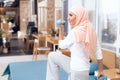 Arab woman doing gymnastics in the bedroom. Royalty Free Stock Photo