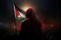 An Arab woman holds a Palestinian flag at a rally in support of Gaza