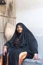 Arab woman seated