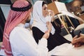 Arab woman with husband at psychologist reception