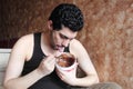 Arab young man with chocolate nutella