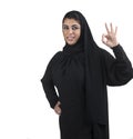 Arabian business woman showing OK hand sign
