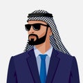 Arabian businessman in sunglasses in traditional clothes