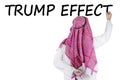 Arabian businessman writes Trump Effect word