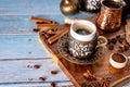 Arabian coffee cup on a traditional serving wood