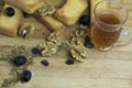 Arabian cooking recipe ingredient black olives zaatar rusk biscuit tea cawah cup glass on wooden platter