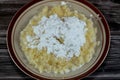 Arabian Cuisine dish of small steamed granules of rolled durum wheat semolina called Koskosi, couscous, kusksi or kseksu, popular Royalty Free Stock Photo